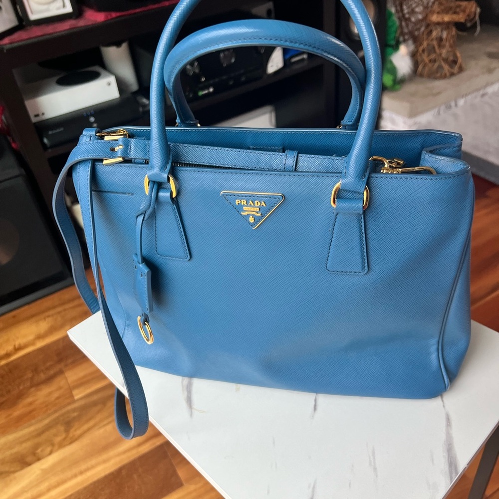 Authentic pre-loved Lux Galleria double zip closure tote.